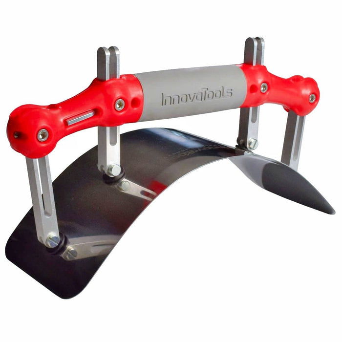 An adjustable finishing curved trowel with a radius adjustadle blade has four adjustment pillars and a red plastic handle with a grey grip area