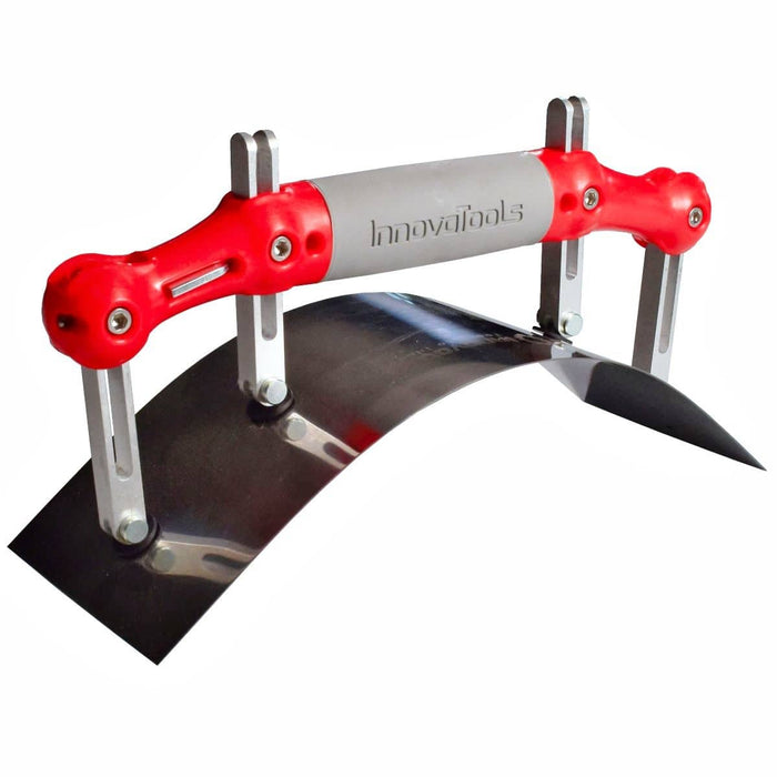 A radius adjustadle curved trowel blade with square corners, four adjustment pillars and a red plastic handle with a grey grip area